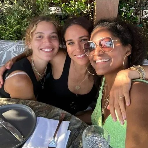 New ‘clue’ Meghan Markle is returning to Instagram as she beams in a birthday selfie with pals over al-fresco lunch