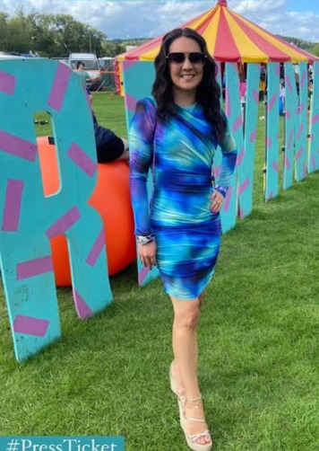 GMB’s Laura Tobin shows off incredible figure in skintight dress as she parties at festival