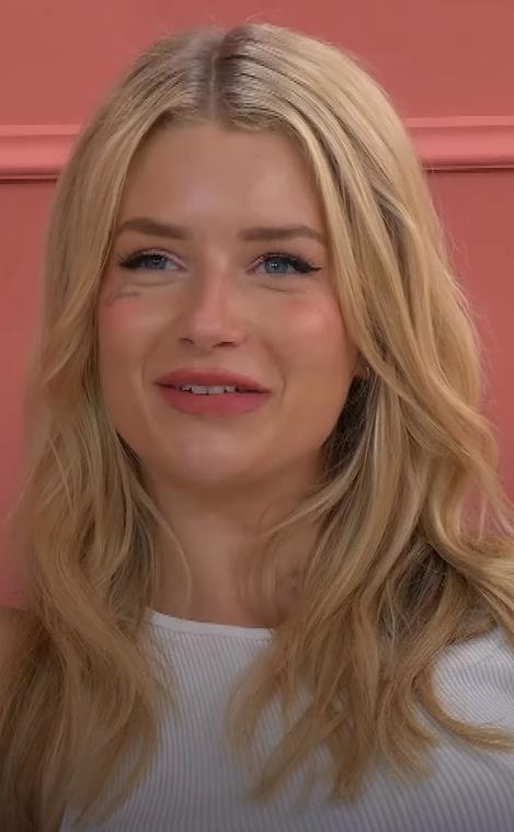 Awkward moment Lottie Moss is left red-faced after co-star misreads her face tattoo