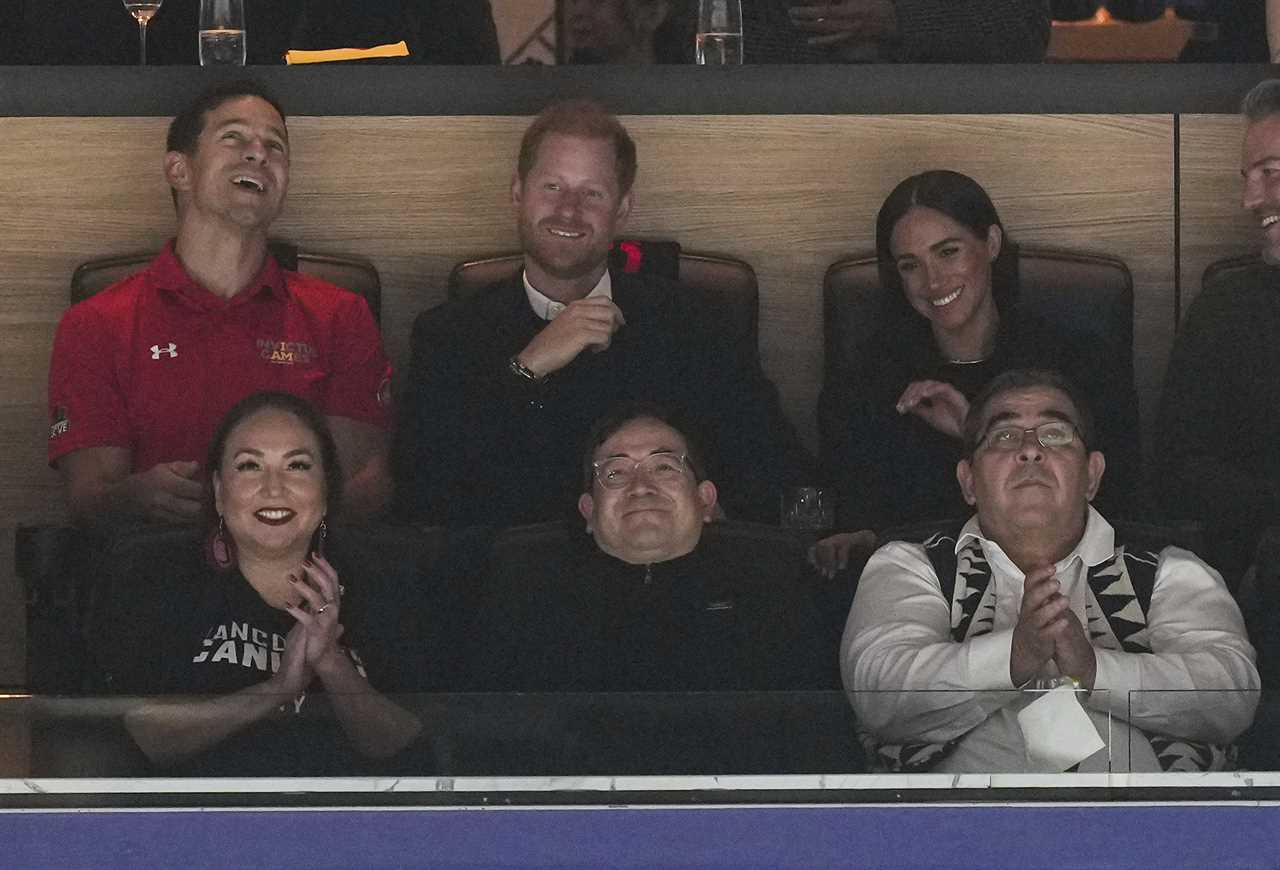 Prince Harry told to drop hockey puck by star as he's too busy smiling for photos