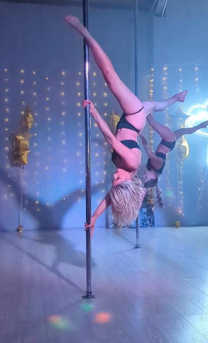 Hollyoaks Star Sarah Jayne Dunn Wows Fans with Pole Dancing Skills in Thong and Thigh High Boots