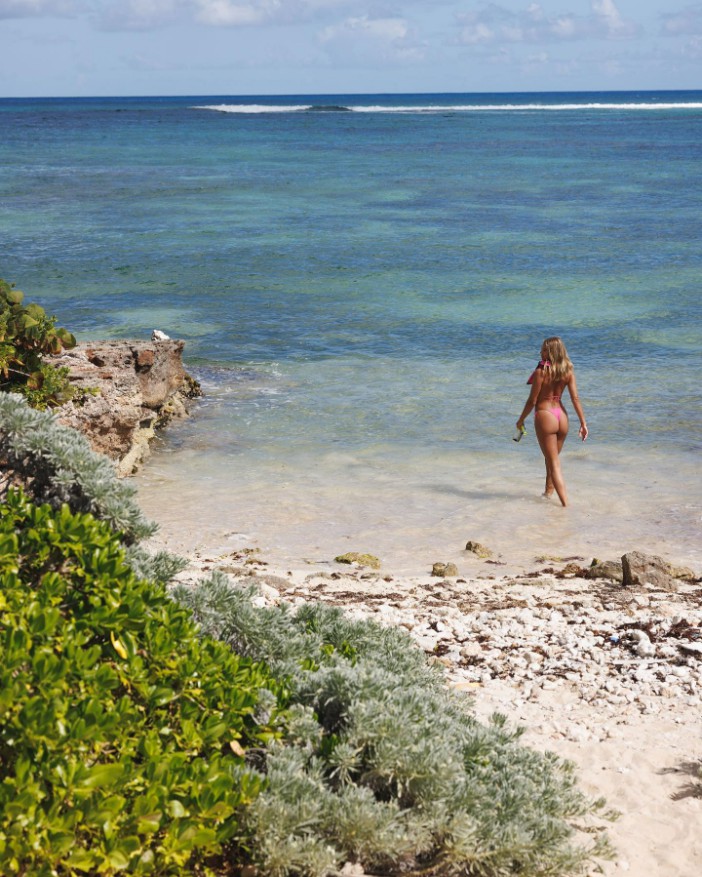 Love Island's Arabella Chi stuns in pink thong bikini post-breakup