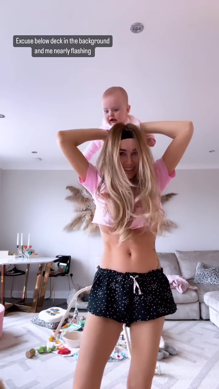 Laura Anderson suffers wardrobe malfunction while dancing with baby Bonnie