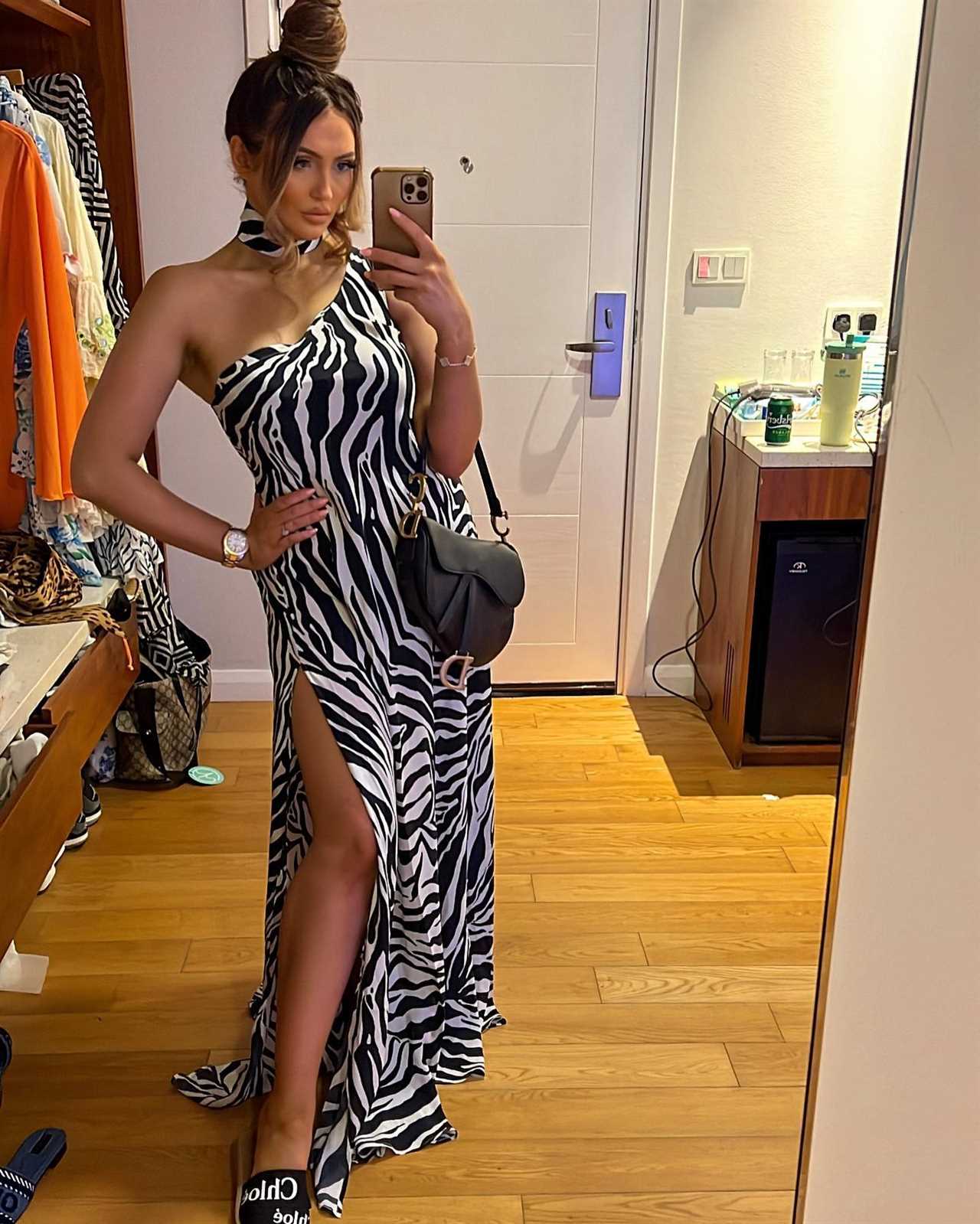 Charlotte Dawson flaunts stunning weight loss in zebra print dress on lavish family getaway in the Maldives