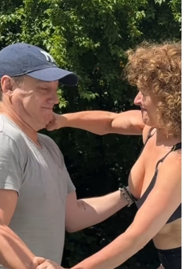 Loose Women Star Nadia Sawalha Playfully Punches Husband After Pool Prank