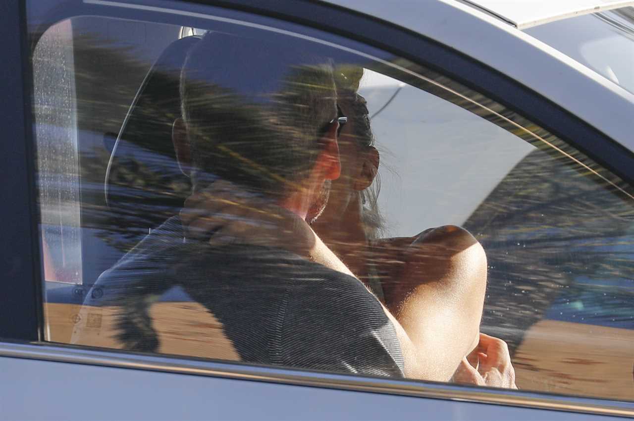 Laura Hamilton spotted kissing new man in a car while wearing bikini