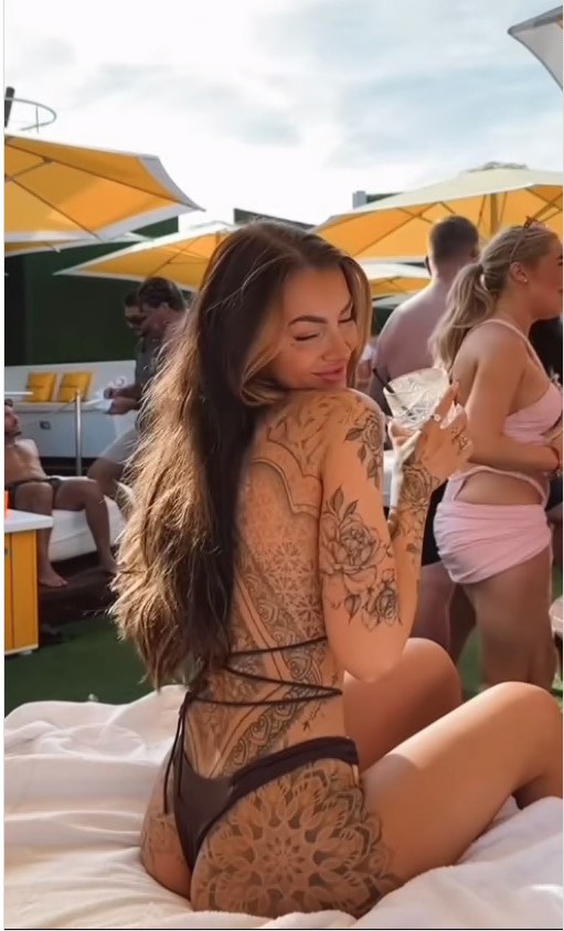 Love Island Star Abi Rawlings Shows Off Back Tattoos in Tiny Thong Bikini