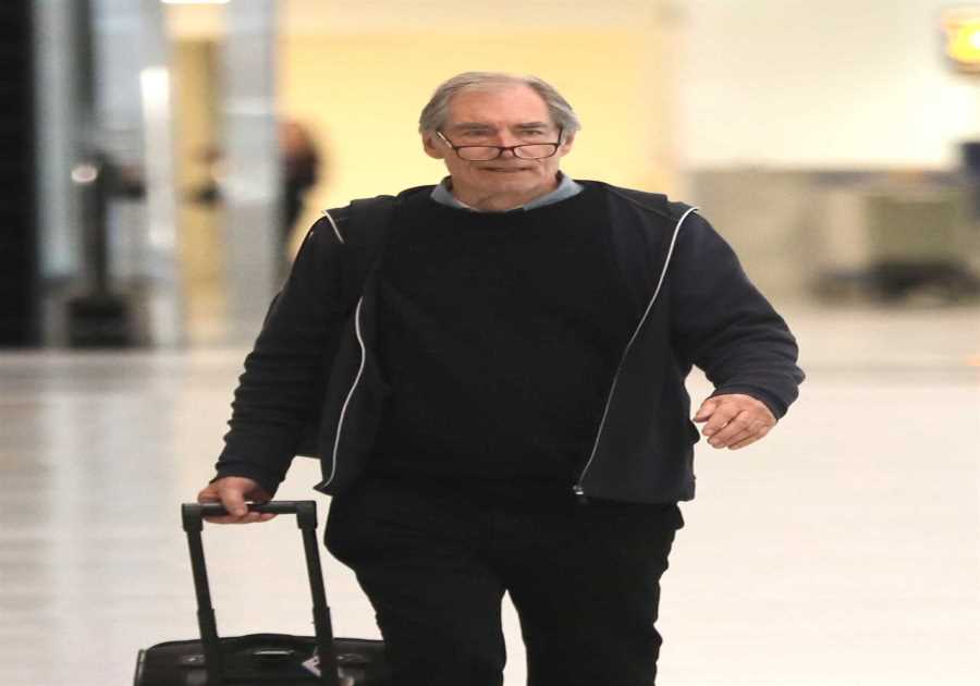 British movie legend, 78, unrecognisable from Hollywood roles as he lands in LA