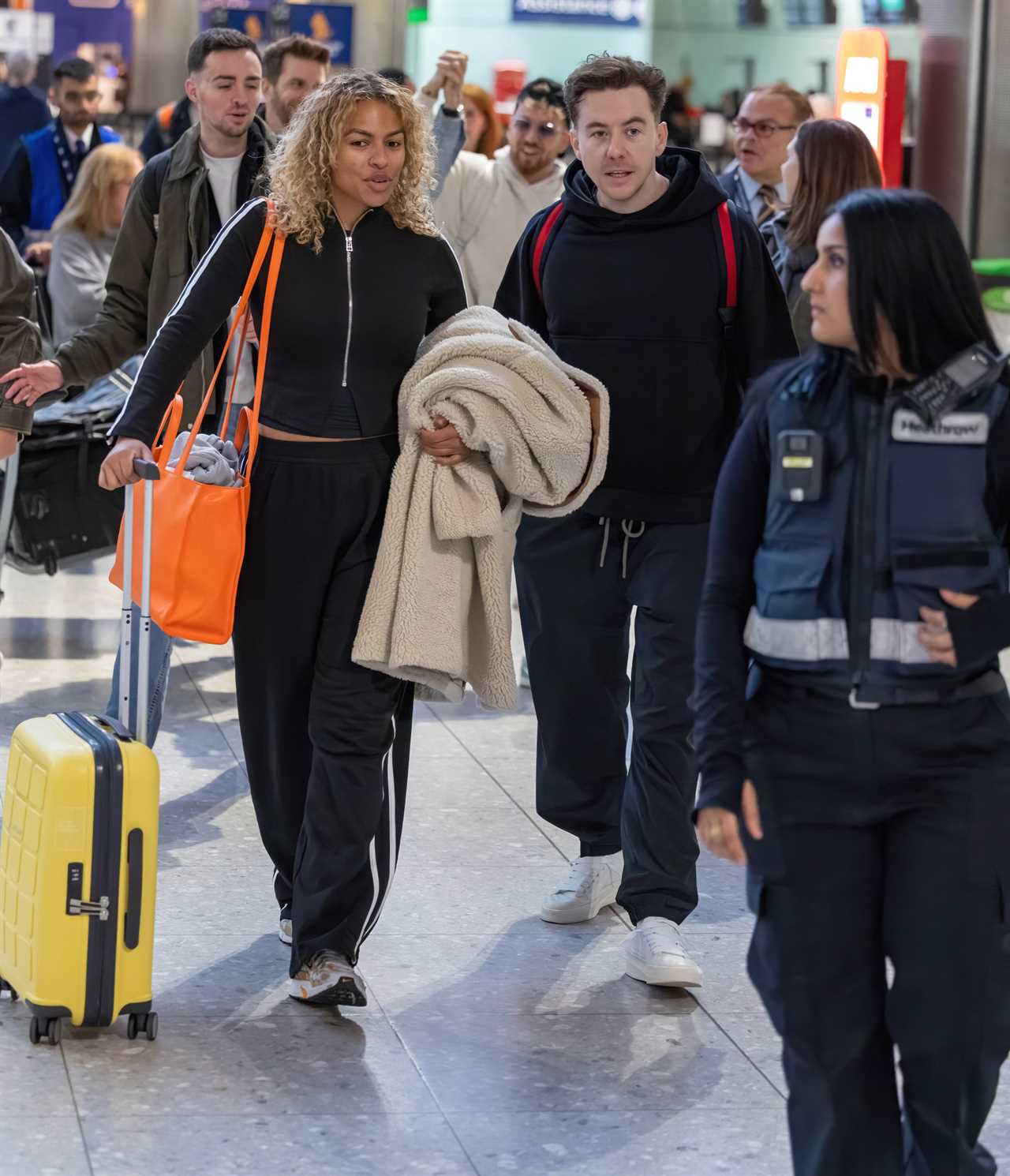 Danny Jones can't contain his excitement as he arrives at Heathrow ahead of I'm A Celebrity