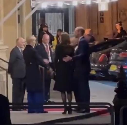 Prince William puts arm around wife Kate Middleton as they attend Festival of Remembrance