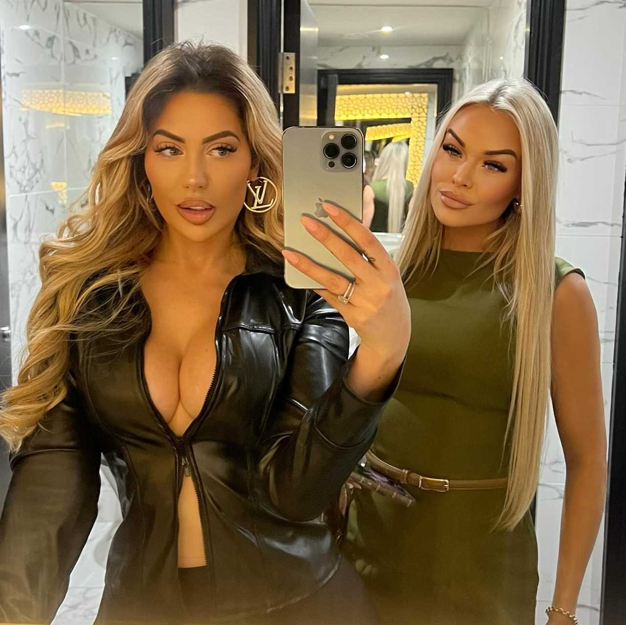 Chloe Ferry stuns in plunging leather shirt and thigh-high boots