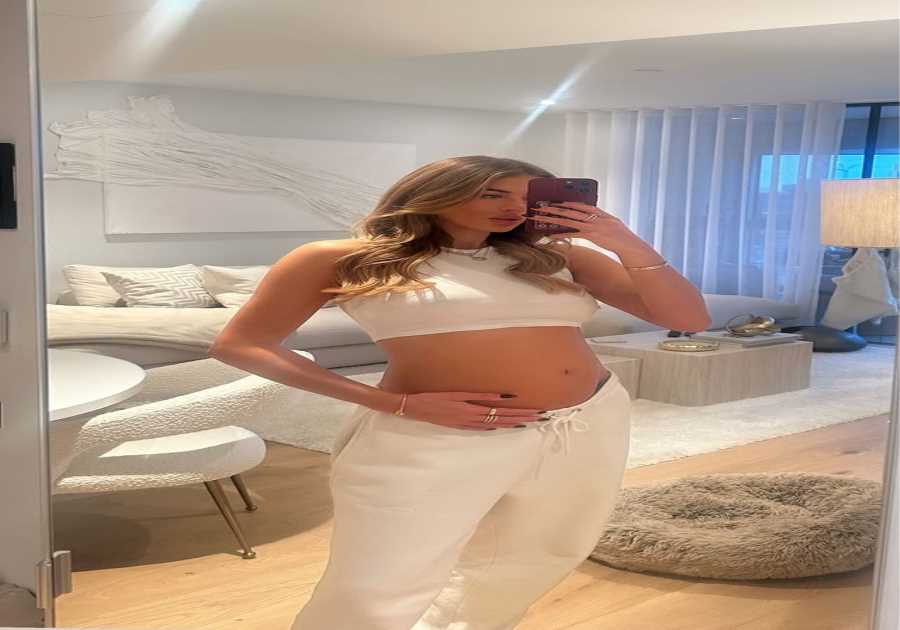 Arabella Chi Flaunts Baby Bump in Crop Top After Surprise Pregnancy Announcement