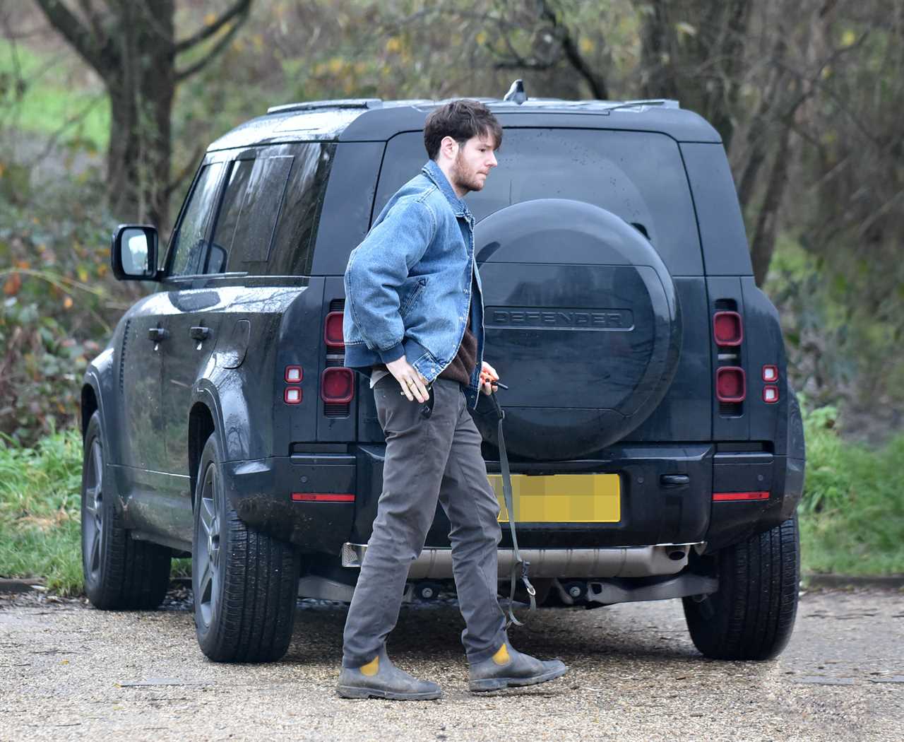 SAS Rogue Heroes star Connor Swindell spotted on casual dog walk in stark contrast to BBC show