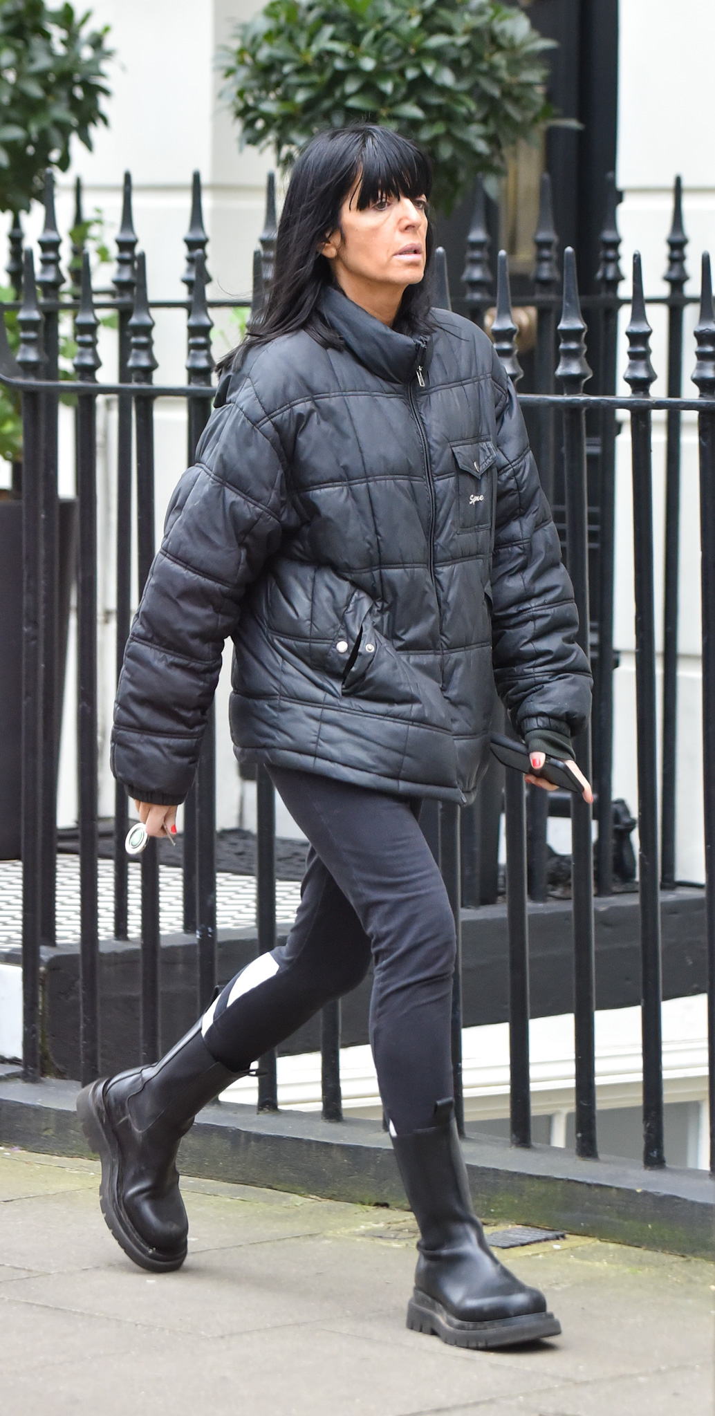 Claudia Winkleman Rocks Pilates Look with Chunky Boots and Padded Jacket